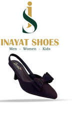 Back view of women's dressy slingback pumps showing the secure buckle closure and stable low heel design.