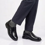 Detailed shot of the reinforced toe and matte leather finish on Inayat Shoes durable school shoes.