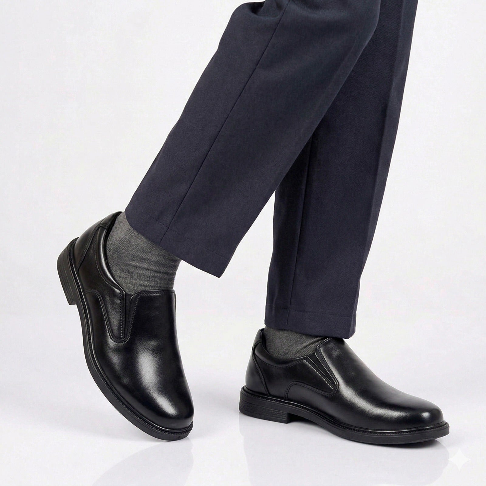 Detailed shot of the reinforced toe and matte leather finish on Inayat Shoes durable school shoes.