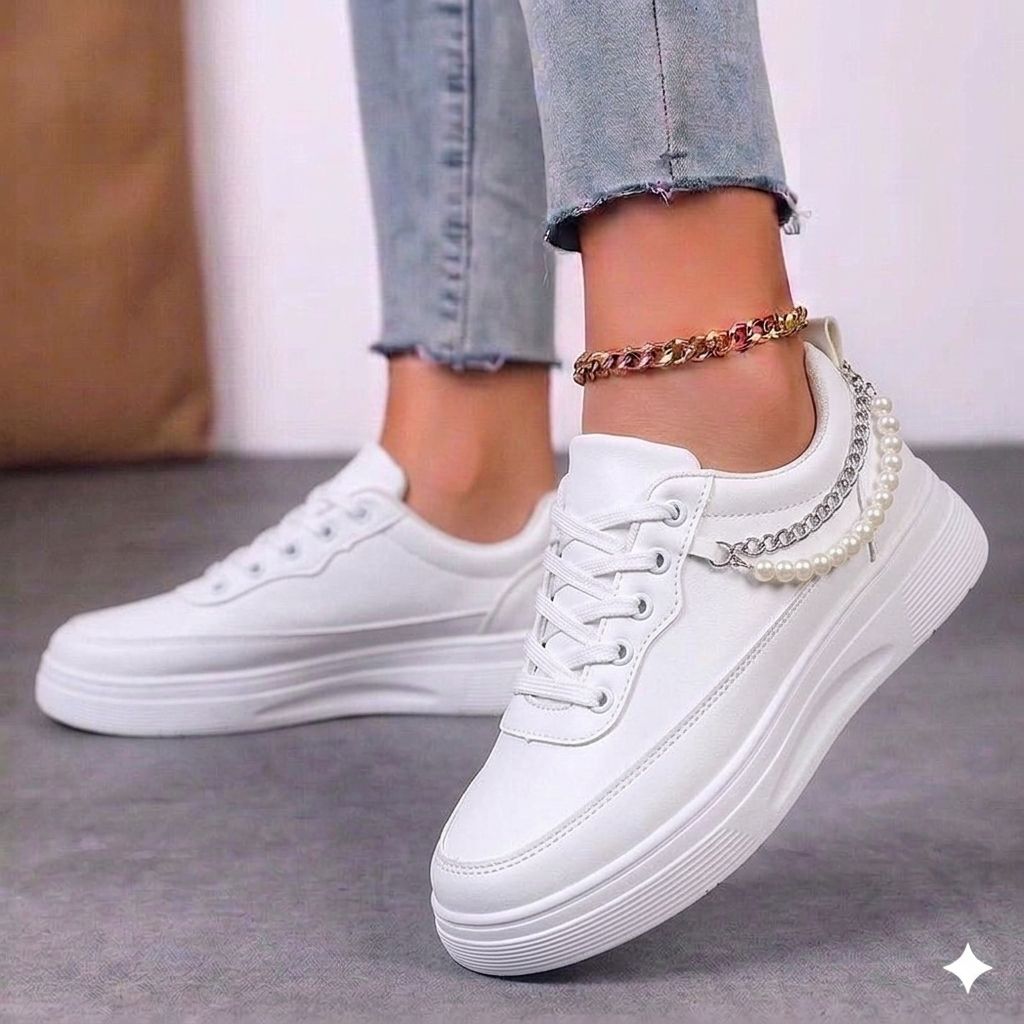 Top view of panda sneakers showing the perforated toe box and clean black laces.