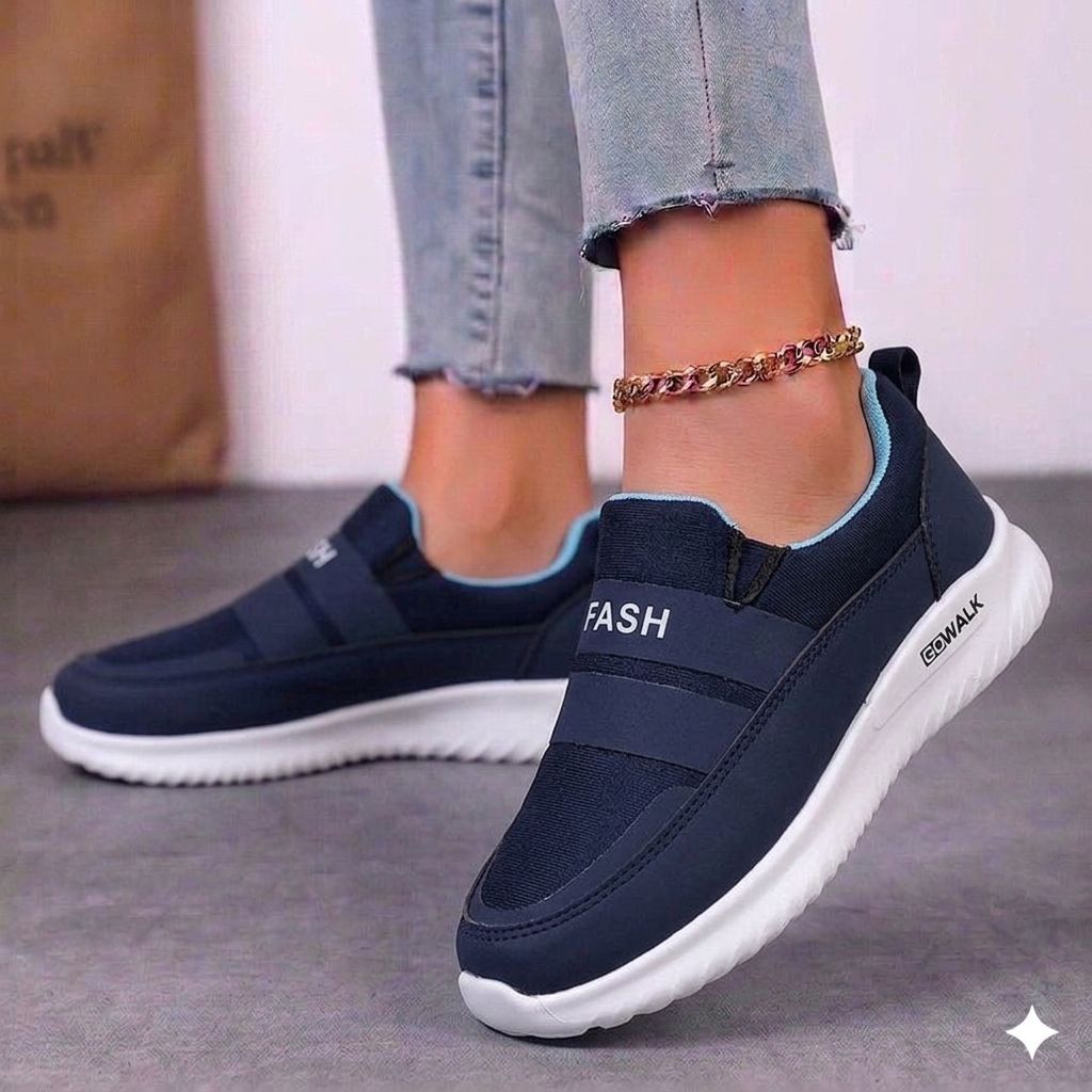 Women's navy blue slip-on walking sneakers with "FASH" elastic strap and white GoWalk sole.
