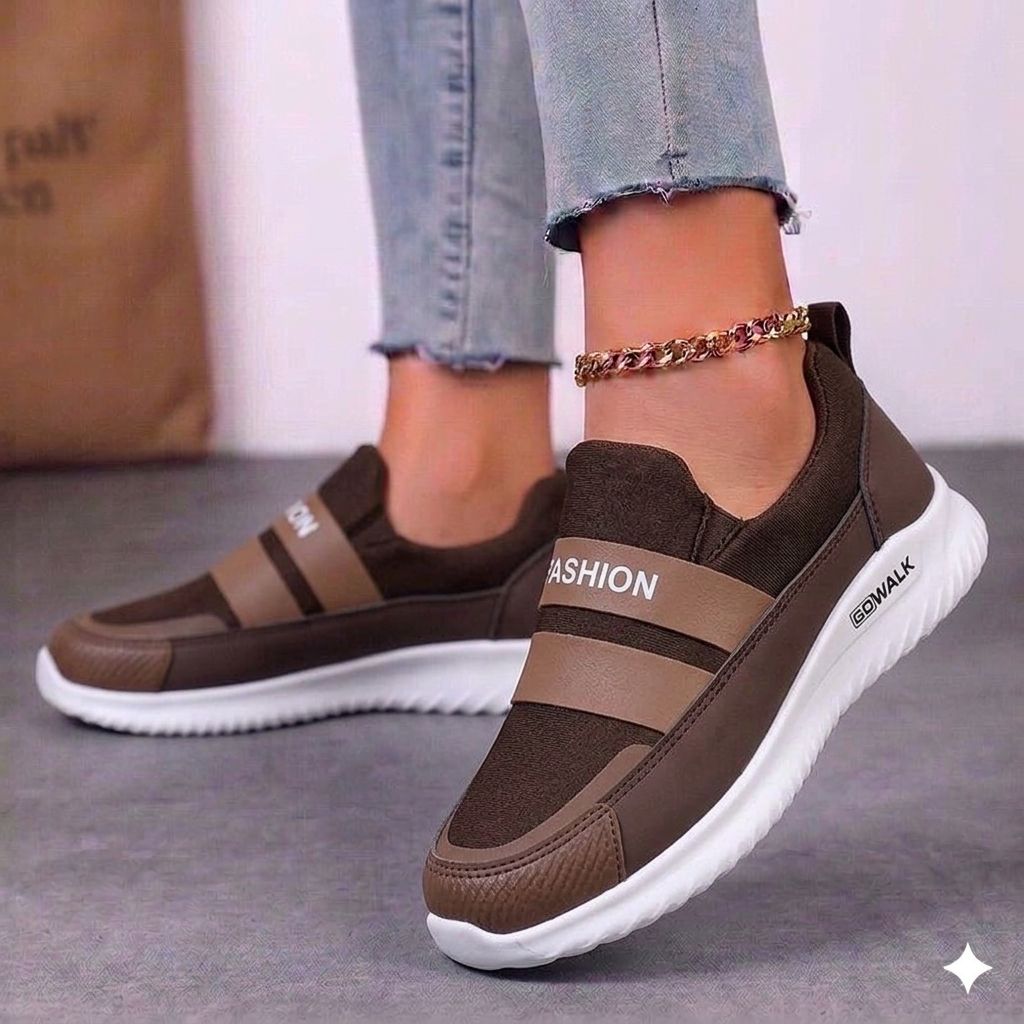 Side view of coffee brown lightweight sneakers for women, perfect for casual professional wear.