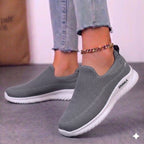 Front view of women's streetwear high-tops showing the clean white toe box and black laces.