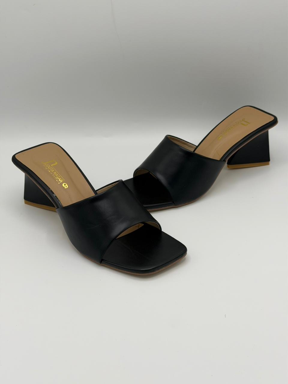 Black open-toe high-heeled sandals on a white background