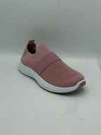 A single slip-on sneaker in dusty rose pink with a white sole, featuring a textured knit upper and a wide elastic strap with the brand name 'kits' embossed on it.
