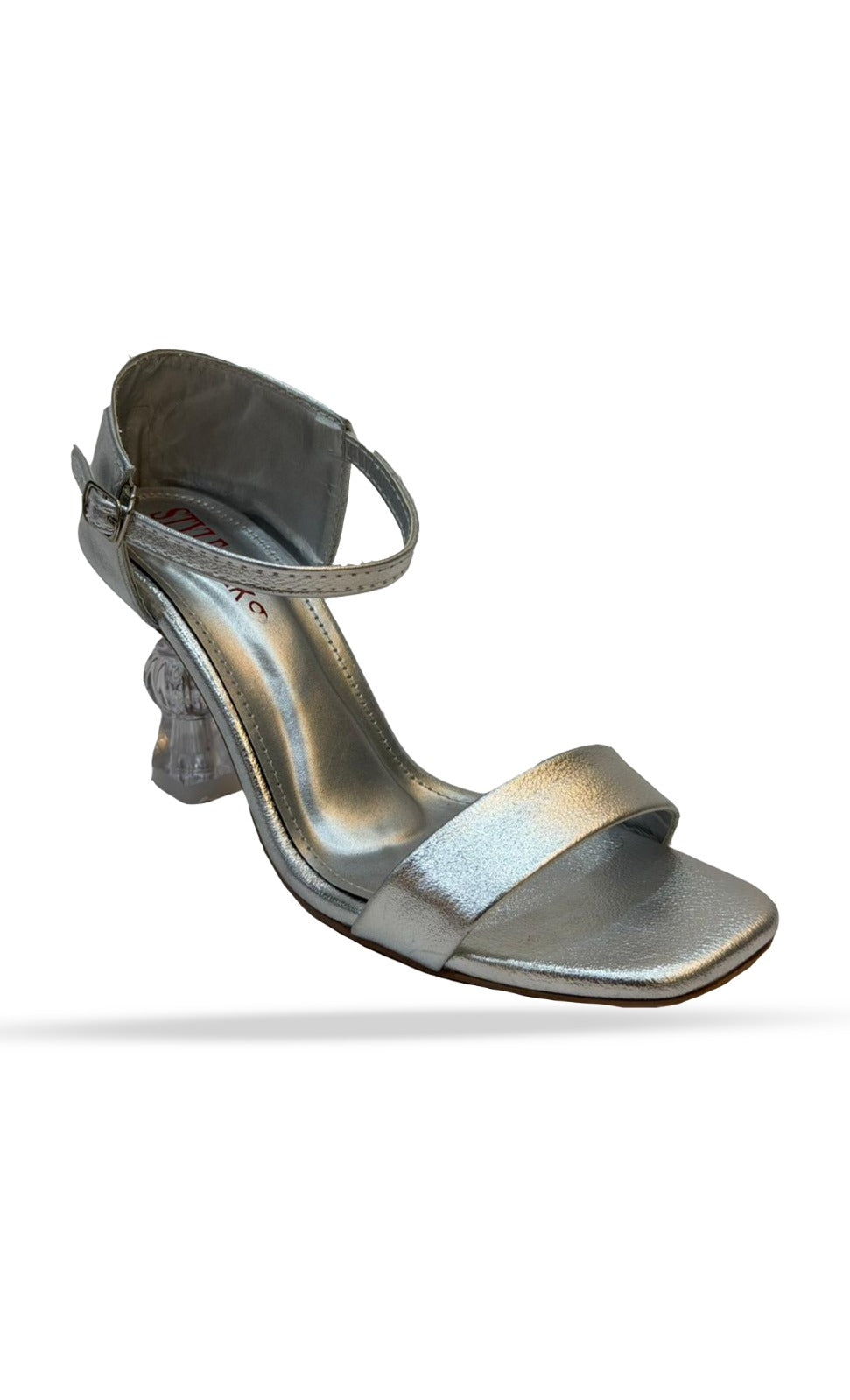Detailed view of the pearl and crystal embellishment on Inayat Shoes formal flat sandals.