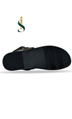 A pair of Inayat Shoes black gold embroidered shoes, a cultural statement piece for the modern groom.