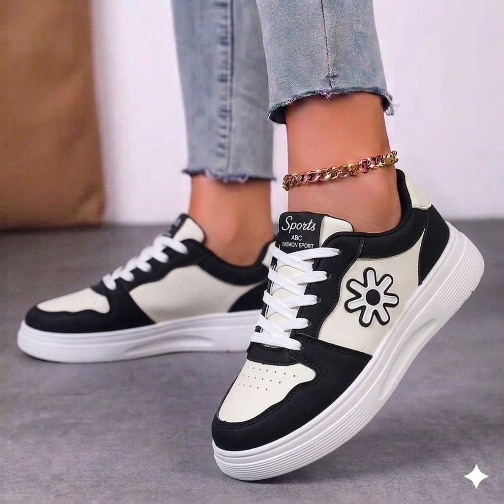 Side view of women's pastel platform sneakers with floral and star patchwork design.