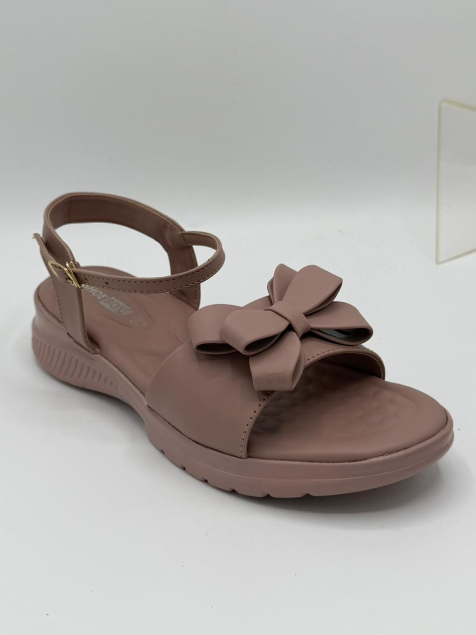 Brown sandal with a bow on a white background