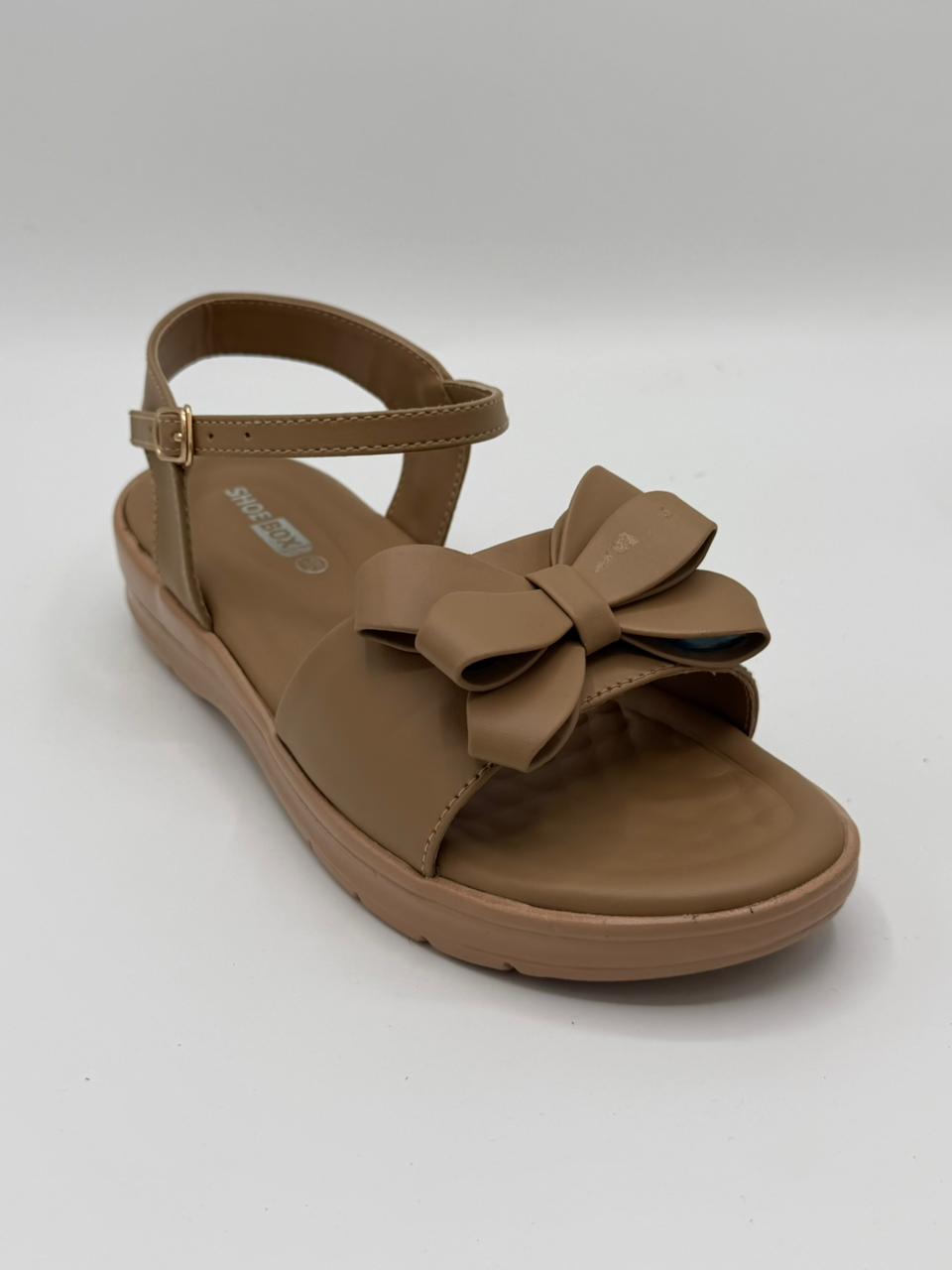 Brown sandal with a bow on a white background